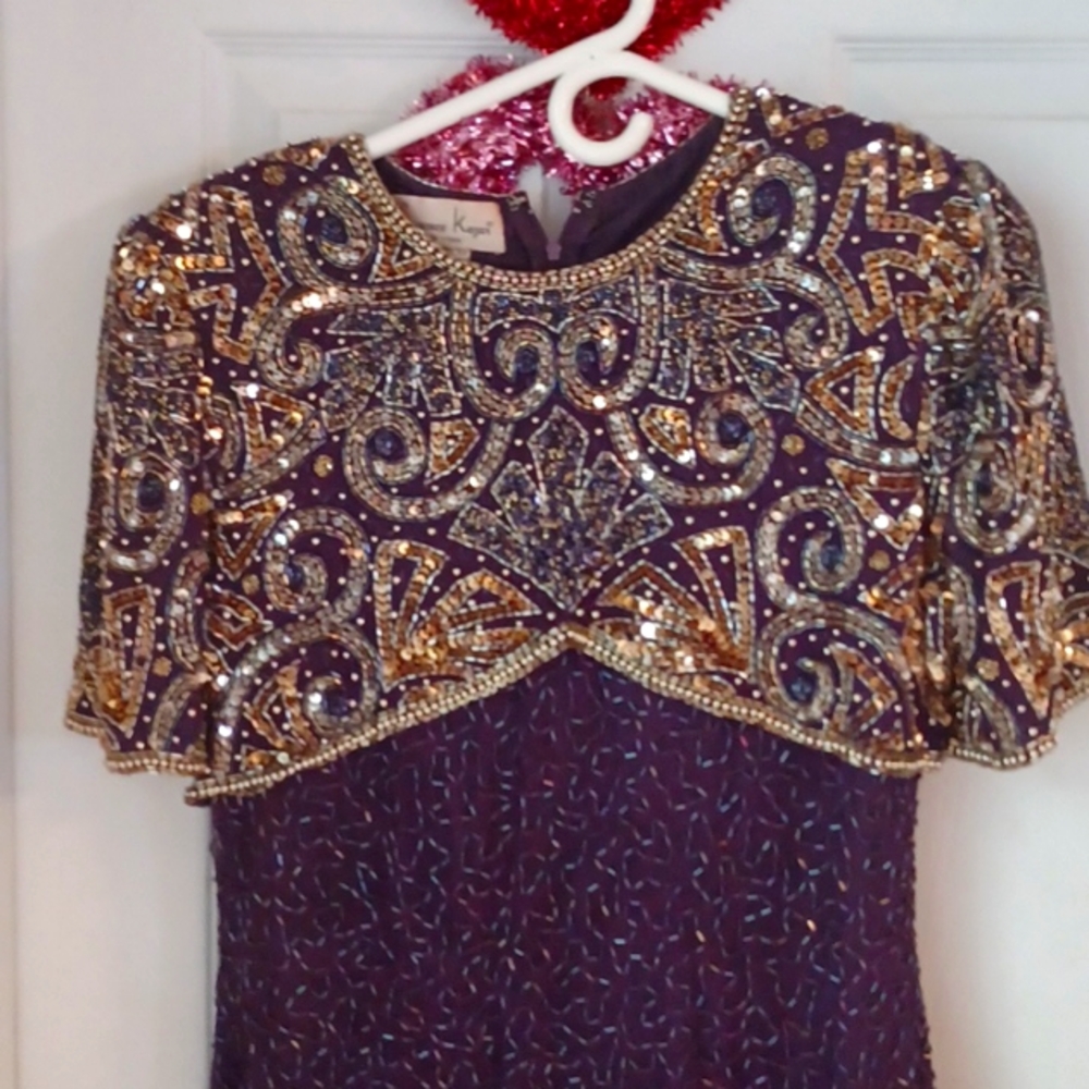 Stunning beaded evening dress. No flaws that I can see. Lined.